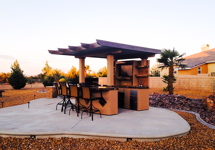 KoKoMo Grills Outdoor Kitchen T.V Media Wall with Pergold and Outdoor Bar Seating BBQ Island